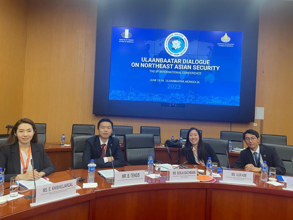 A group of people sitting at a tableDescription automatically generated