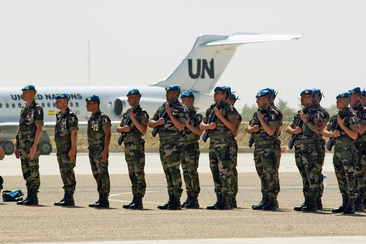 Officers of the United Nations Mission in the Central African Republic and Chad (MINURCAT) take over military operations of the mission from the European Forces (EUFOR) during a transfer of authority ceremony.