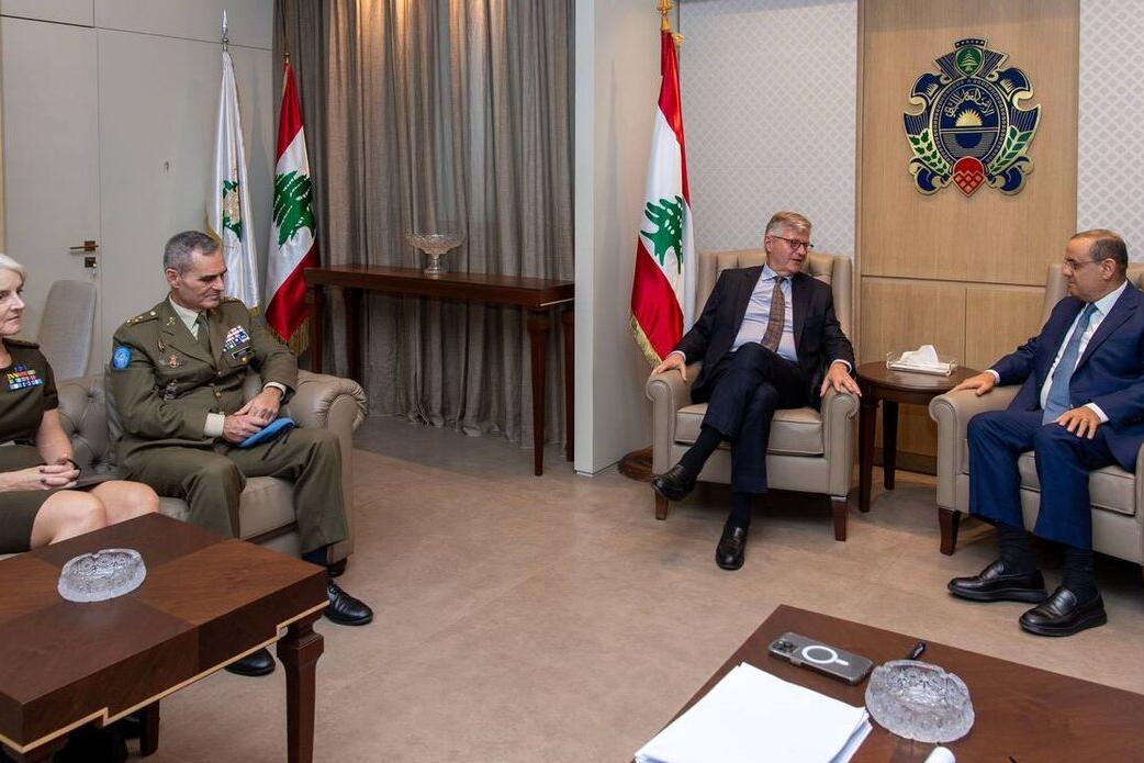 High level representatives attend a meeting.